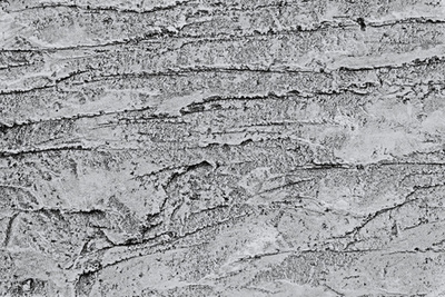 与磨擦和裂缝的墙壁片段